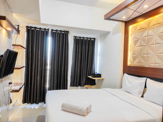 Bedroom 3, Homey and Comfy Studio at Vida View Makassar Apartment By Travelio, Makassar