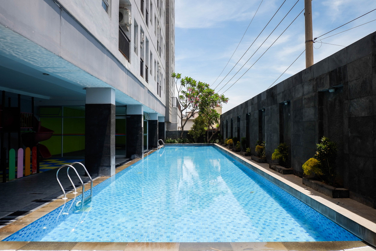 Sport & Beauty 3, Trendy and Tidy Studio Room at Puri Mas Apartment By Travelio, Surabaya