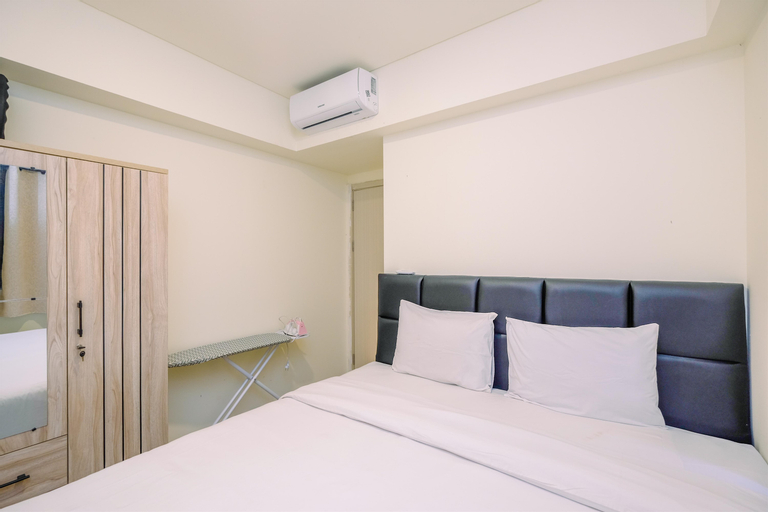 Bedroom 1, Cozy and Simply 2BR at Meikarta Apartment By Travelio, Cikarang