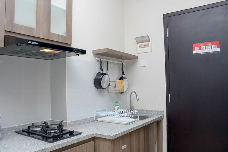 Homey and Cozy Living 1BR Apartment at Atlanta Residences By Travelio, Depok