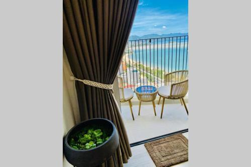 QSea Nest (Gold Coast Apartment). Sea-view from beds and balcony, Nha Trang