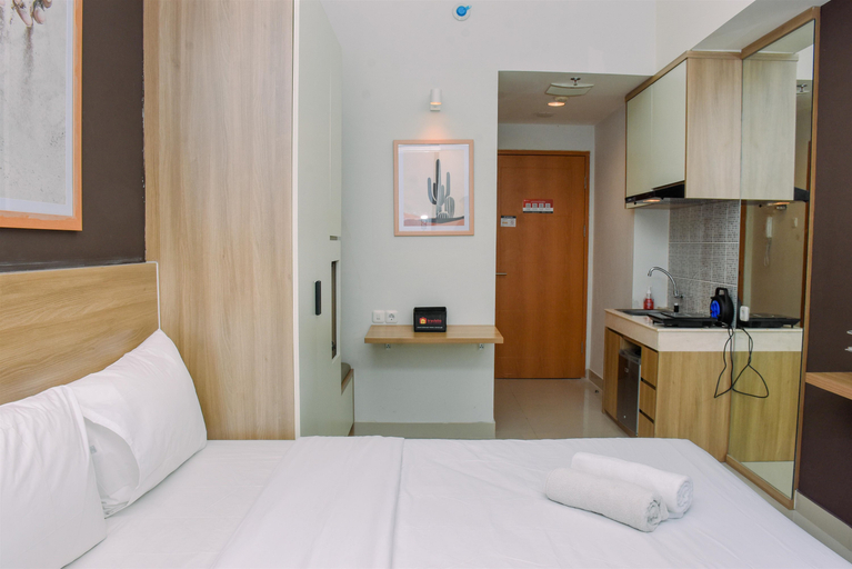 Bedroom 3, Comfy Studio Room at Evenciio Margonda Apartment By Travelio, Depok