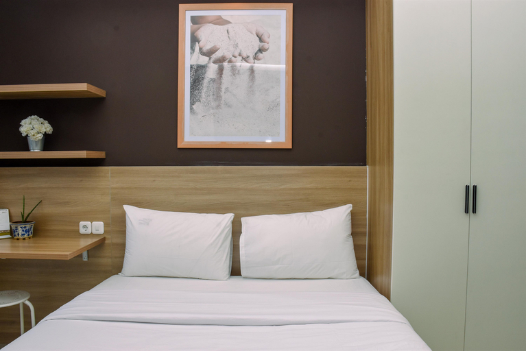 Bedroom 2, Comfy Studio Room at Evenciio Margonda Apartment By Travelio, Depok
