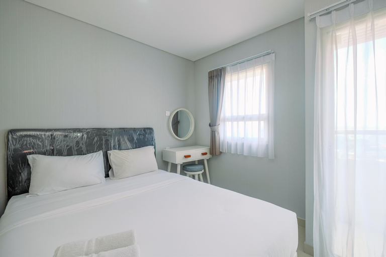 Bedroom 1, Cozy Living 1BR Apartment at Atlanta Residences By Travelio, Depok