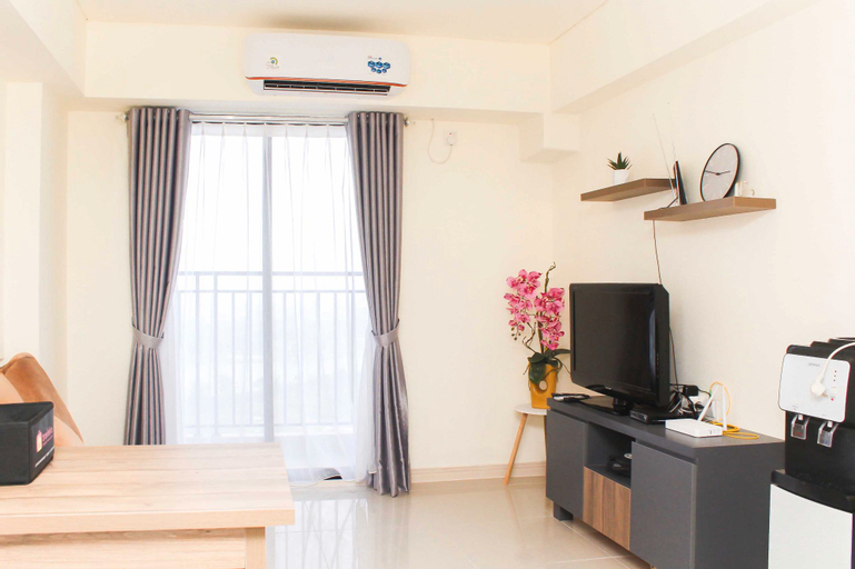 Bedroom 1, Nice and Comfort 2BR Apartment at Meikarta By Travelio, Cikarang
