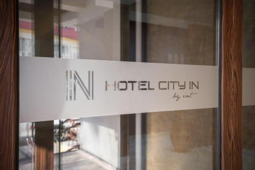 Hotel City IN, 
