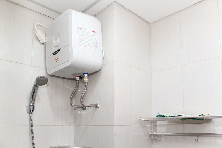 Bathroom 5, Homey and Tidy Studio Monroe Tower Apartment By Travelio, Cikarang