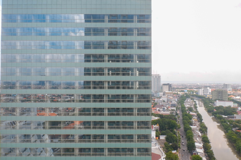 Exclusive and Vibrant 1BR Apartment at Praxis By Travelio, Surabaya