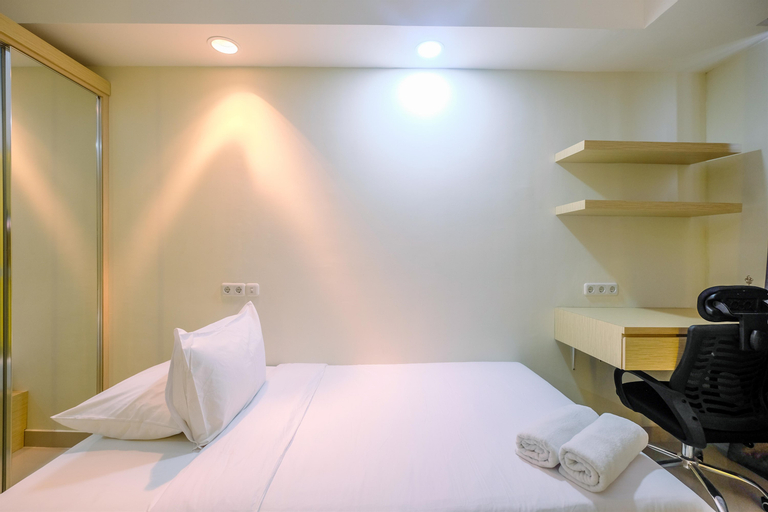 Bedroom 1, Cozy Living Studio Room at Evenciio Margonda Apartment By Travelio, Depok