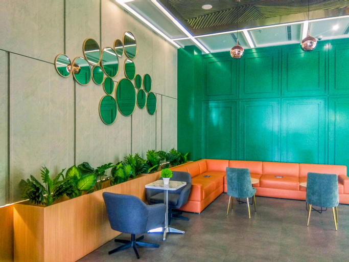 Public Area, Cozy Living Studio Room at Evenciio Margonda Apartment By Travelio, Depok