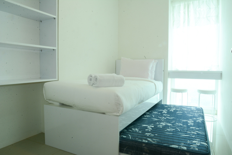 Bedroom 1, Scandinavian Style Residence 2 BR Woodland Park Apartment By Travelio, South Jakarta