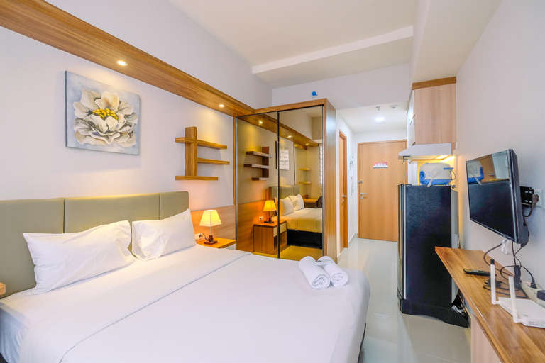 Bedroom 1, Elegant Studio at Evenciio Apartment Margonda By Travelio, Depok
