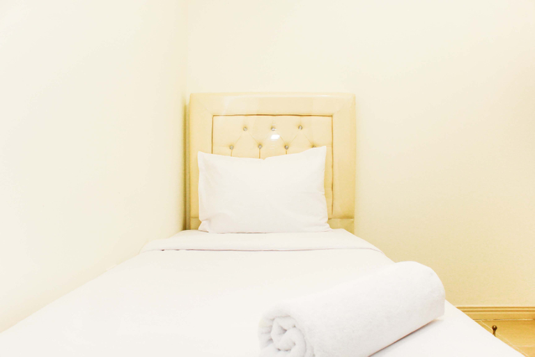 Bedroom 4, Spacious and Bright 2BR at Meikarta Apartment By Travelio, Cikarang