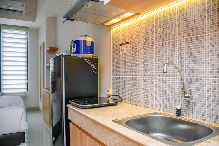 Others 4, Nice and Cozy Studio at Evenciio Apartment By Travelio, Depok