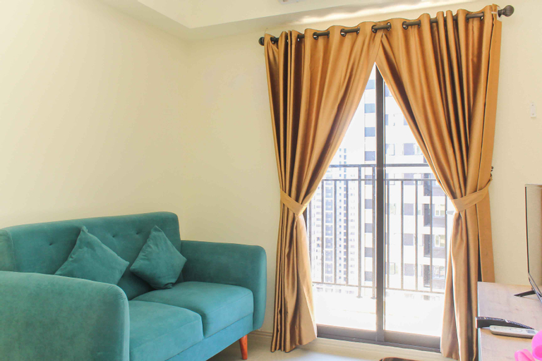 Simply and Warm 2BR at Meikarta Apartment By Travelio, Cikarang