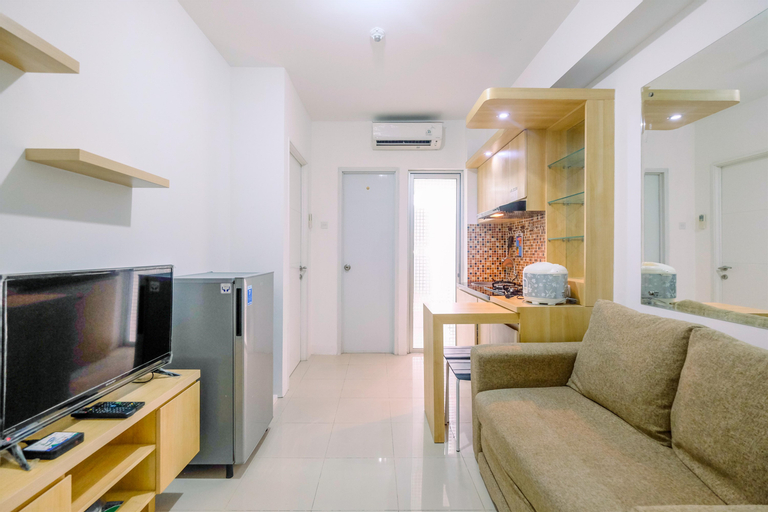 Minimalist and Cozy Living 2BR at Bassura City Apartment By Travelio, Jakarta Timur