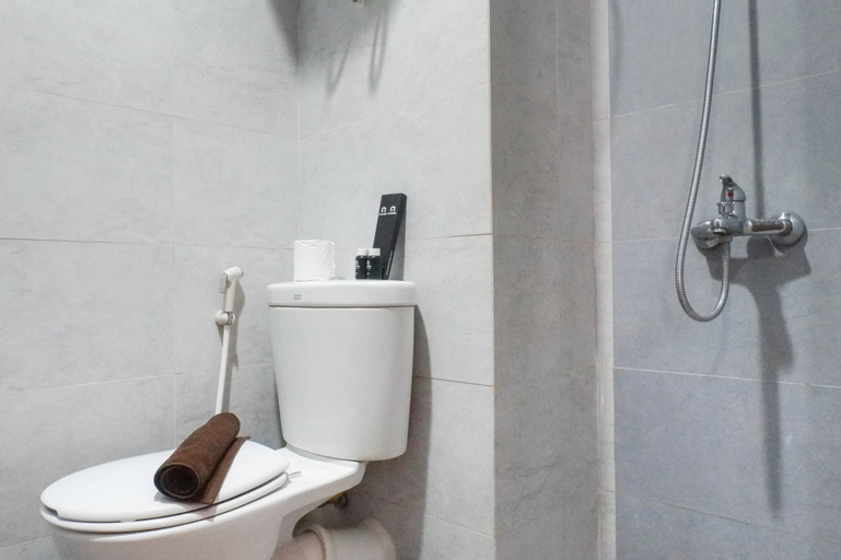 Bedroom 3, Chic and Cozy Studio Apartment at Taman Melati Surabaya By Travelio, Surabaya
