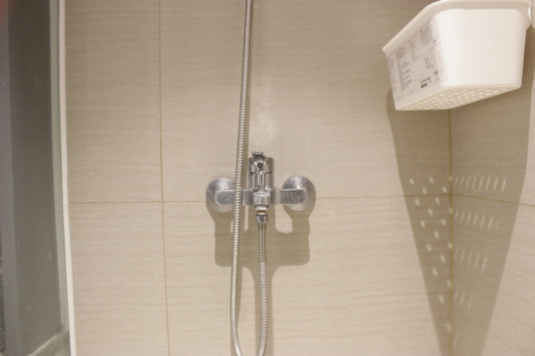 Bathroom 5, Modern & Cozy 2BR Apartment at Tamansari Tera Residence By Travelio, Bandung
