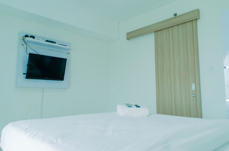 Elegant 1BR without Living Room at Bintaro Embarcadero Suites Apartment By Travelio, South Tangerang