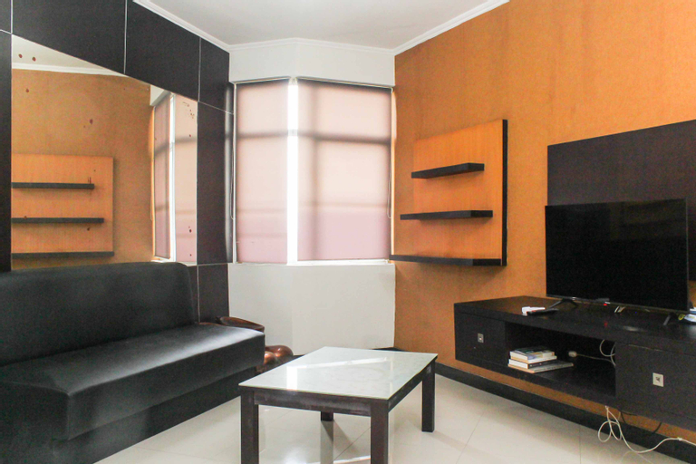 Comfortable 2BR with Extra Room at Crown Court Executive Condominium By Travelio, Cikarang
