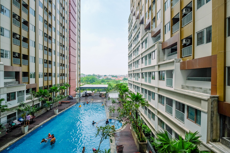 Sport & Beauty 3, Comfortable Pool View Studio Room at LRT City Jatibening Apartment By Travelio, Bekasi