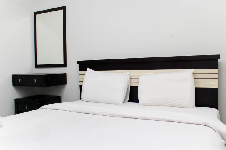 Bedroom 3, Comfortable 2BR with Extra Room at Crown Court Executive Condominium By Travelio, Cikarang