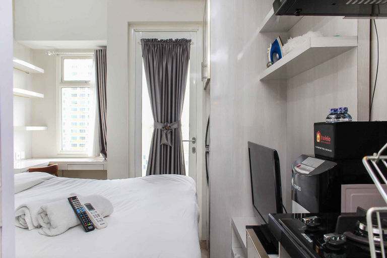 Bedroom 2, Nice and Cozy Studio Apartment at Springlake Summarecon Bekasi By Travelio, Bekasi