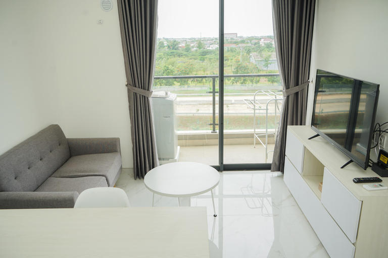 Fully Furnished with Cozy Design 2BR at Sky House BSD Apartment By Travelio, South Tangerang