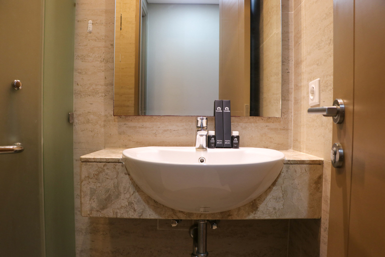 Bedroom 3, Minimalist and Comfort 1BR at Gold Coast Apartment By Travelio, North Jakarta