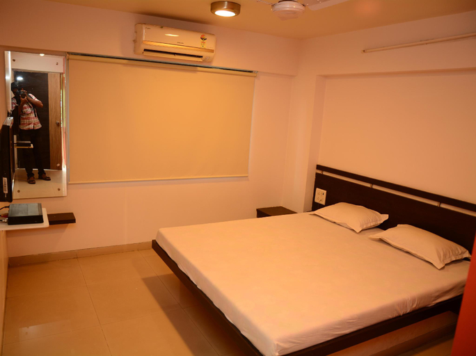 Bedroom 2, Hotel Palms Residency, Nashik