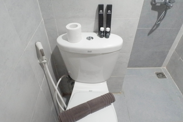Bedroom 2, Cozy and Compact Studio Apartment at Taman Melati Surabaya By Travelio, Surabaya