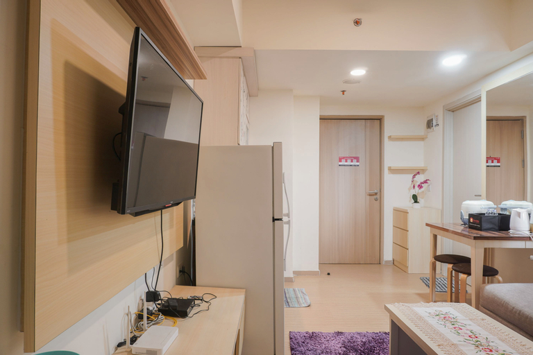 Bedroom 1, Comfort 1BR with Working Room at Meikarta Apartment By Travelio, Cikarang