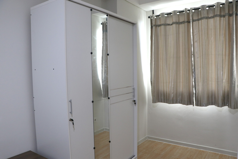 Bedroom 3, Comfort and Minimalist 2BR at Daan Mogot City Apartment By Travelio, West Jakarta