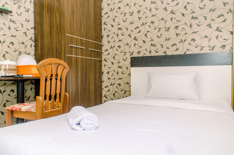 Bedroom 2, Warm and Cozy Studio Apartment (No Kitchen) at Aeropolis Residence By Travelio, Tangerang