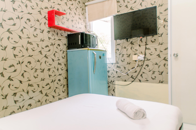 Bedroom 4, Warm and Cozy Studio Apartment (No Kitchen) at Aeropolis Residence By Travelio, Tangerang