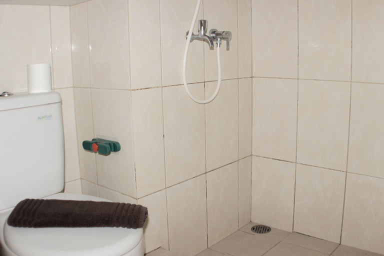 Bedroom 4, Fancy Studio at Springlake Summarecon Bekasi Apartment By Travelio, Bekasi
