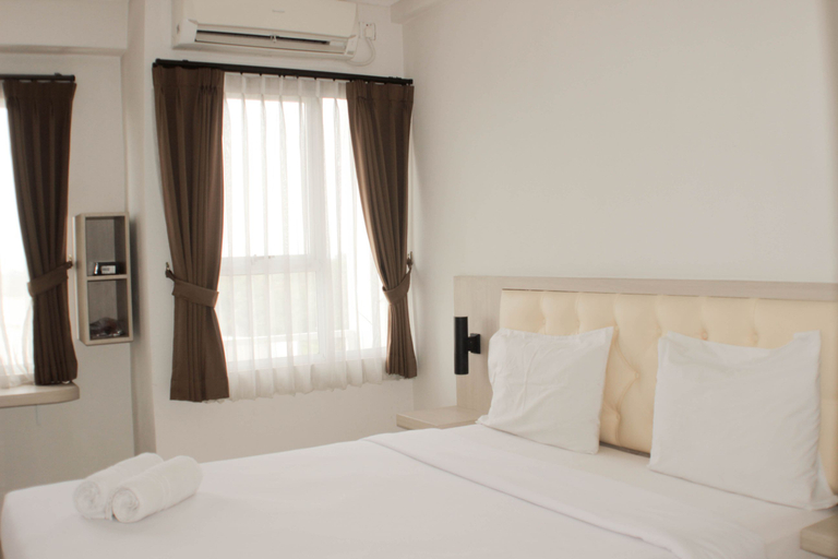 Bedroom 4, Homey and Cozy Studio Apartment at Elvis Tower By Travelio, Cikarang