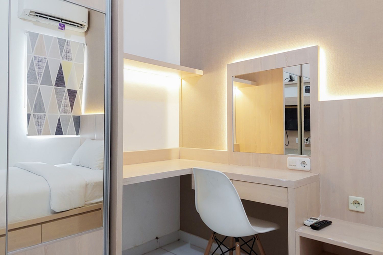 Bedroom 4, Cozy and Minimalist Studio (No Kitchen) at Aeropolis Apartment By Travelio, Tangerang