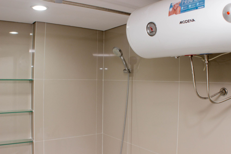 Bathroom 5, Comfortable and Spacious Studio at Azalea Suites Apartment By Travelio, Cikarang
