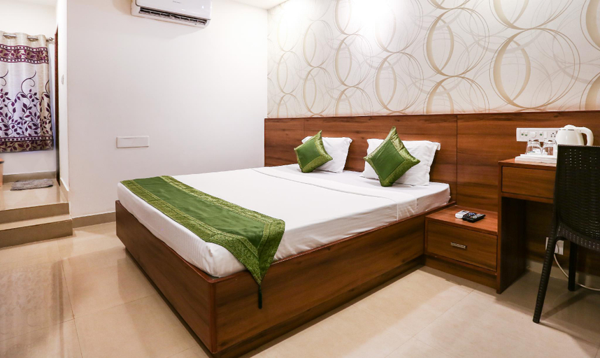 Bedroom 3, Treebo Comforts Inn, University Road Deralakatte, Dakshina Kannada