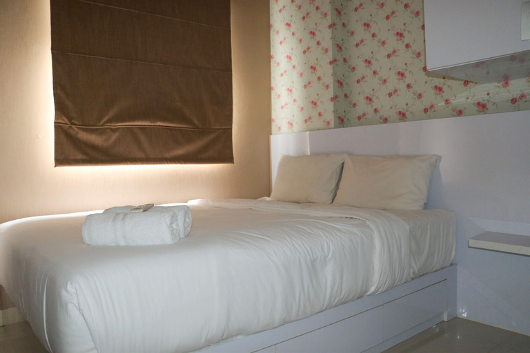 Bedroom 1, Homey and Cozy Stay 2BR at Green Pramuka City Apartment By Travelio, Central Jakarta