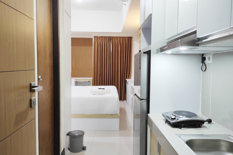 Bedroom 2, Tranquil Studio Apartment at Vida View Makassar By Travelio, Makassar