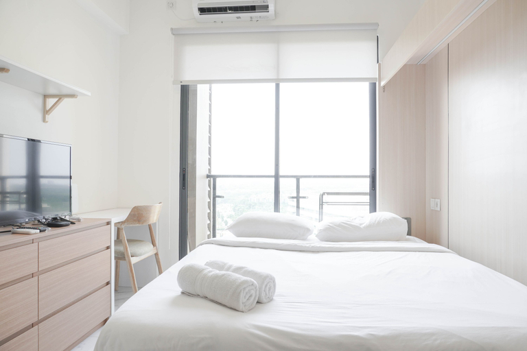 Bedroom 1, Warm and Cozy Stay Studio at Sky House BSD Apartment By Travelio, South Tangerang