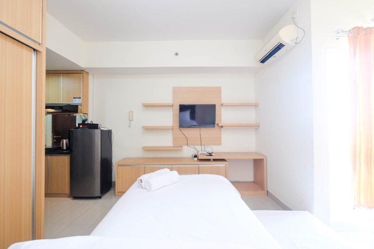 Bedroom 3, Minimalist Studio @ Taman Melati Apt By Travelio, Depok