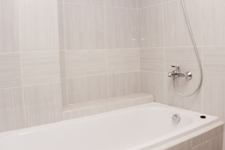 Bathroom 4, Minimalist and Cozy Studio at Vasanta Innopark Apartment By Travelio, Cikarang