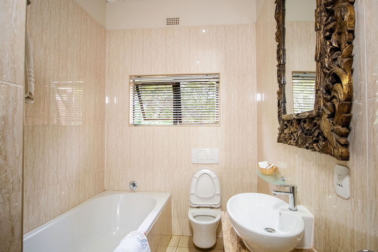 Bathroom 5, The Victoria Falls Deluxe Suites, Hwange