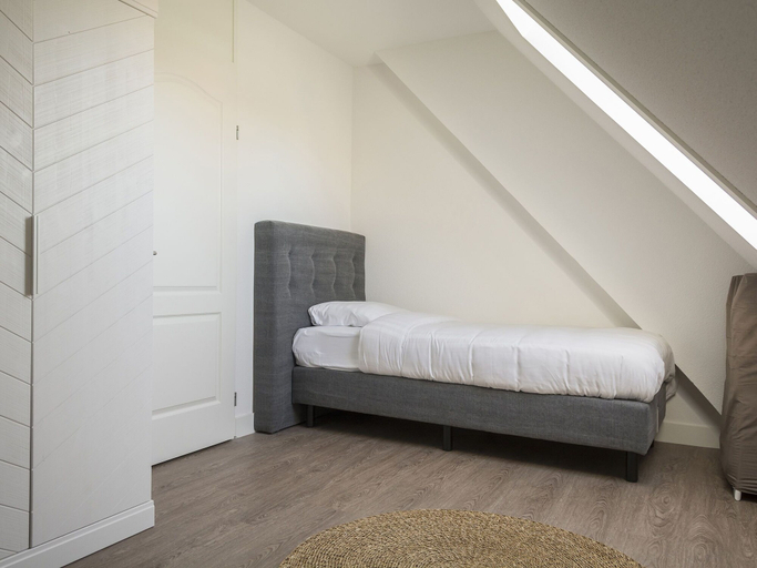 Bedroom 2, Apartment in tasteful farmhouse in De Cocksdorp, Texel