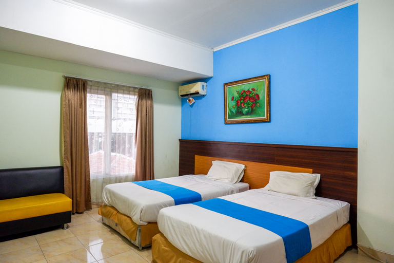 Bedroom 5, Pineapple Mansion Solo Mitra RedDoorz near RS JIH Solo, Solo