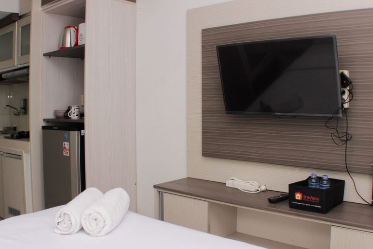 Bedroom 2, Cozy and Warm Studio at Grand Sentraland Karawang Apartment By Travelio, Karawang
