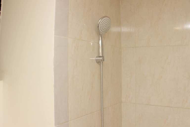 Bathroom 5, Luxury and Comfy 2BR at Meikarta Apartment By Travelio, Cikarang